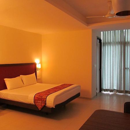 Ixora Suites Bangalore Oda fotoğraf