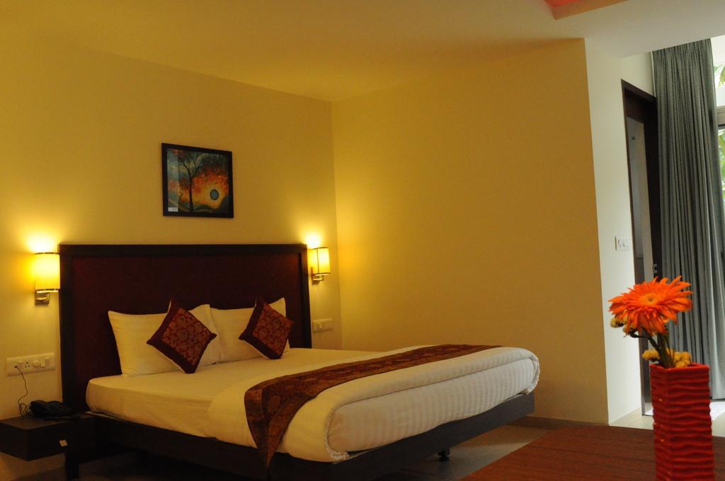 Ixora Suites Bangalore Oda fotoğraf