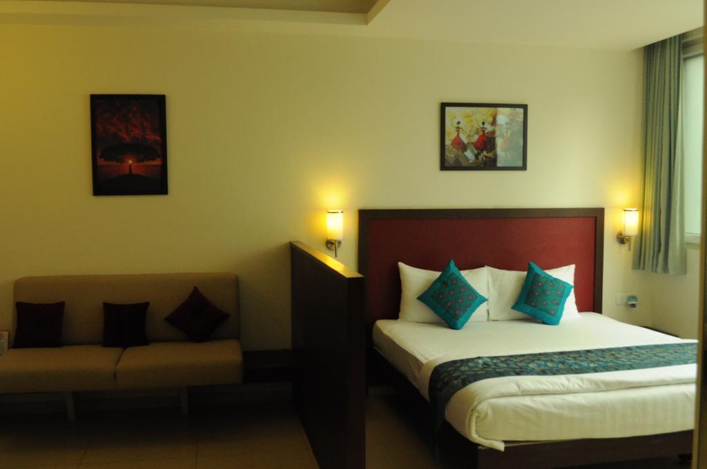 Ixora Suites Bangalore Oda fotoğraf
